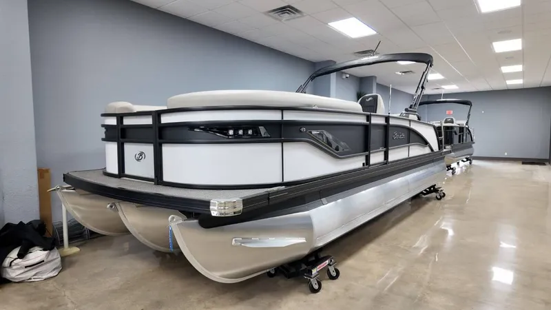 Slide: The Image of 2026 Barletta Corsa 23UC pontoon boat in showroom. - 14