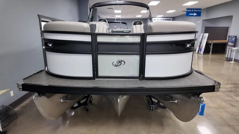 Slide: The Image of 2026 Barletta Corsa 23UC pontoon boat in showroom. - 17