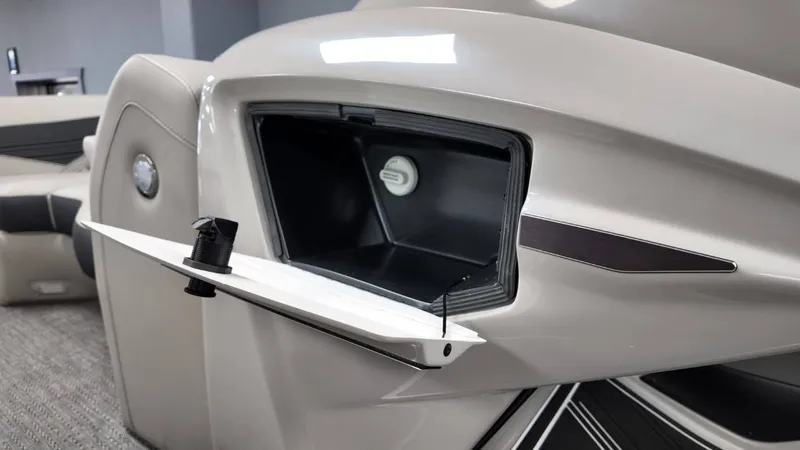 Slide: The Image of Barletta Corsa 23UC 2026, open storage compartment in boat. - 36