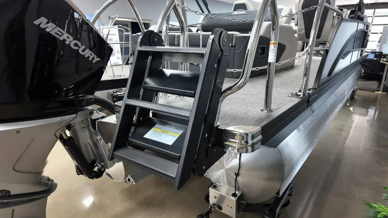 Slide: The Image of 2026 Barletta Corsa 23UC pontoon boat with Mercury engine. - 4