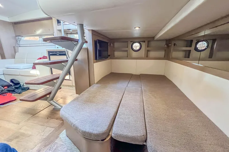 Slide: The Image of 2018 Sea Ray Sundancer 350 Coupe interior with cozy cabin and modern staircase. - 33