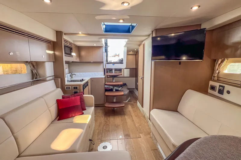 Slide: The Image of Luxurious interior of 2018 Sea Ray Sundancer 350 Coupe with modern amenities and elegant design. - 35