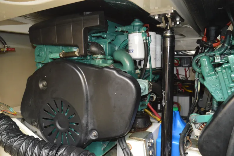 Slide: The Image of Engine compartment of a 2009 Hinckley 37 boat, showcasing mechanical components. - 37