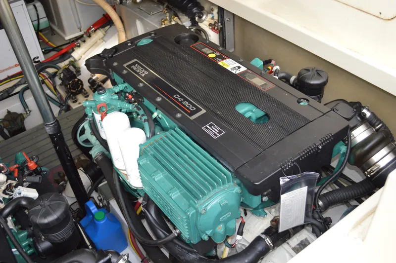 Slide: The Image of Engine compartment of a 2009 Hinckley 37 boat with Volvo Penta D4-300 engine. - 39