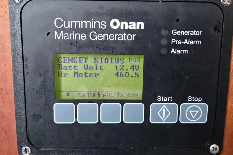 Slide: The Image of Control panel of Cummins Onan marine generator on 2009 Hinckley 37 boat. - 33