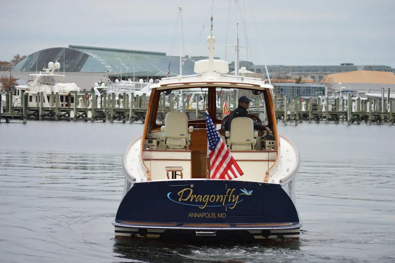Slide: The Image of Hinckley 37 boat "Dragonfly" in Annapolis harbor, 2009, with American flag. - 6