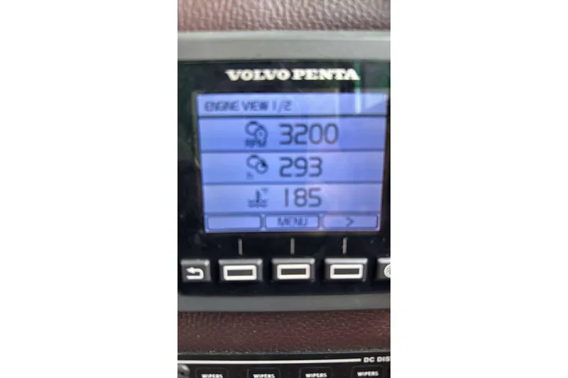 Slide: The Image of Volvo Penta engine display on 2014 Ranger Tugs R-27 showing RPM and other metrics. - 18