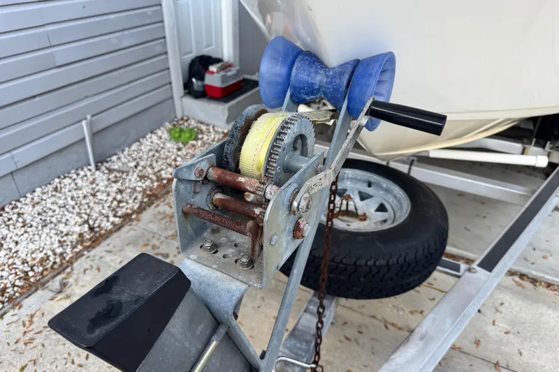 Slide: The Image of Trailer winch for 2006 Century 2001 Center Console boat, showing rust and wear. - 27