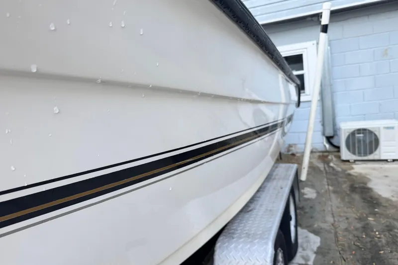 Slide: The Image of Side view of a 2006 Century 2001 Center Console boat on a trailer. - 3