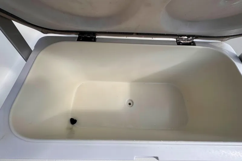 Slide: The Image of Open storage compartment in 2017 NauticStar 1810 NauticBay boat. - 23