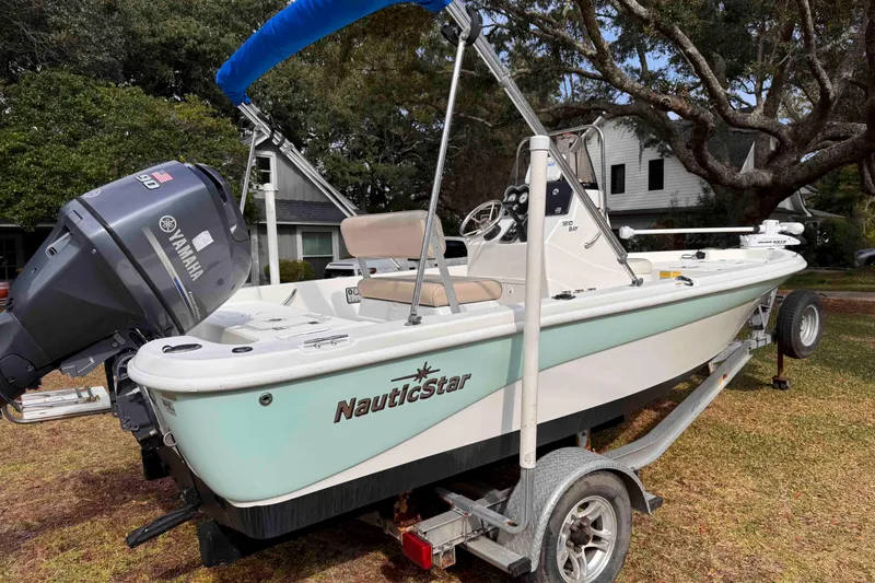 Slide: The Image of 2017 NauticStar 1810 NauticBay boat on trailer with Yamaha outboard motor. - 6