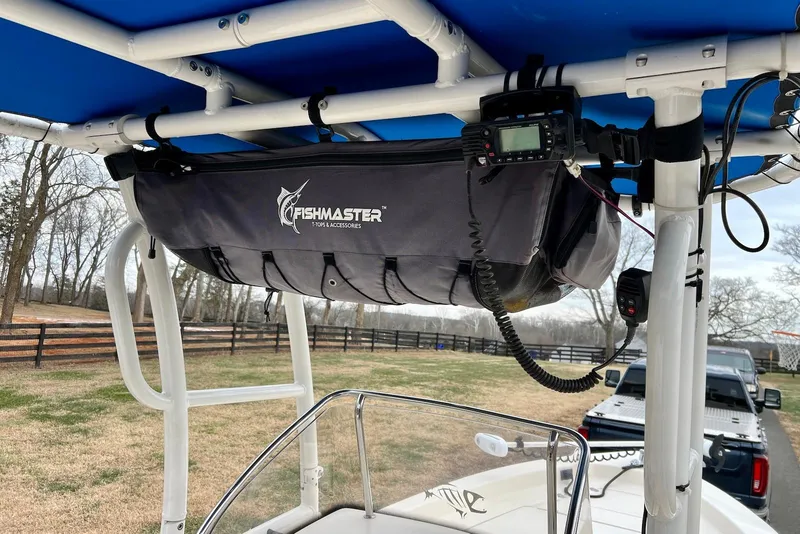 Slide: The Image of 2009 Scout 240 Bay Scout boat with Fishmaster T-top and accessories. - 10