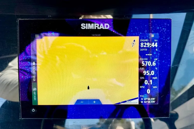 Slide: The Image of Simrad navigation display on 2023 Sea Ray SPX 210 Outboard boat. - 16