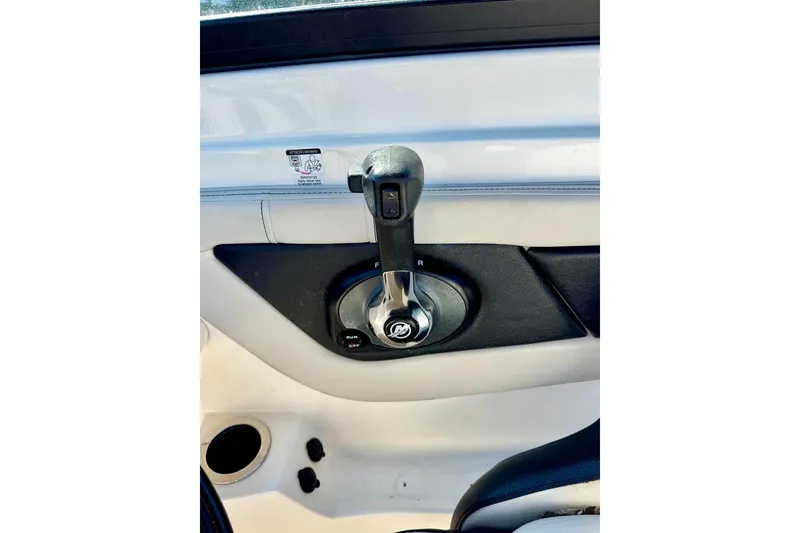 Slide: The Image of Throttle control of 2023 Sea Ray SPX 210 Outboard boat, featuring sleek design. - 18