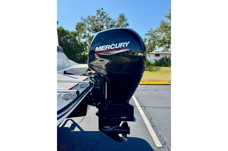 Slide: The Image of 2023 Sea Ray SPX 210 Outboard with Mercury engine, parked outdoors. - 27