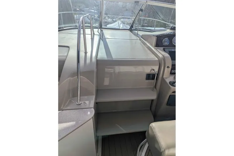 Slide: The Image of Interior view of 2007 Sea Ray 310 Sundancer boat with steps and railing. - 8