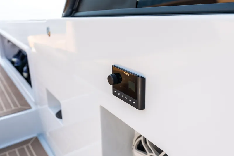 Slide: The Image of Control panel on 2023 VanDutch 32 yacht, featuring sleek white exterior design. - 21