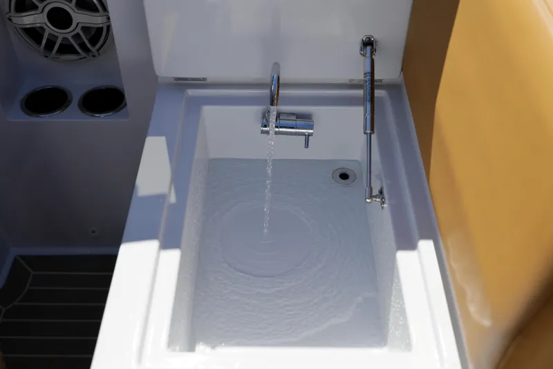 Slide: The Image of 2023 VanDutch 32 yacht sink with running water and modern fixtures. - 31