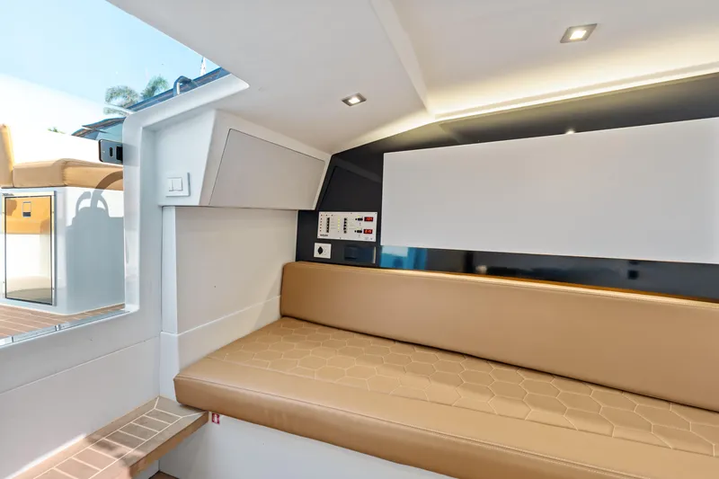 Slide: The Image of Interior of 2023 VanDutch 32 yacht with beige seating and modern design. - 36