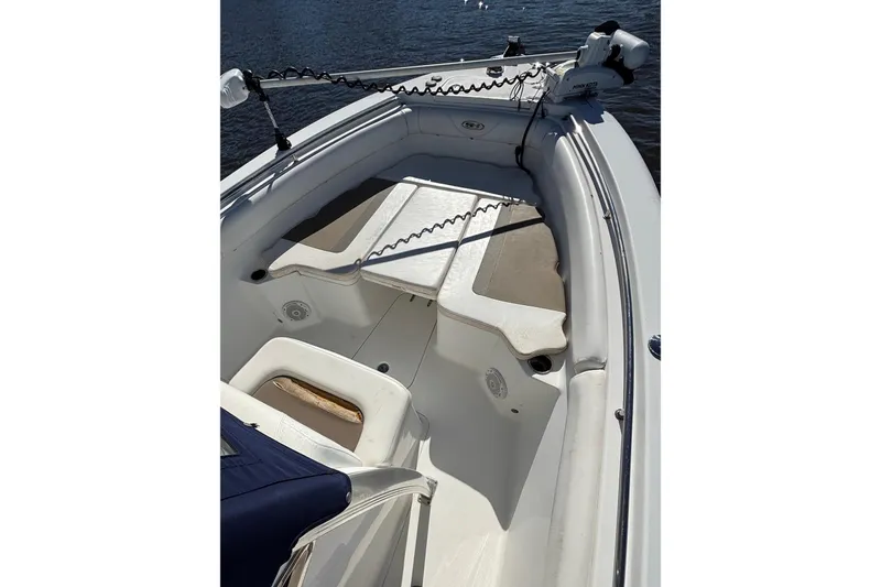 Slide: The Image of 2011 Sea Hunt Gamefish 25 boat interior with seating and fishing equipment. - 9