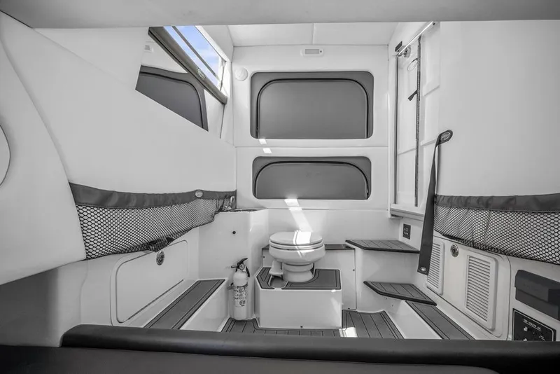 Slide: The Image of Interior of 2021 Nor-Tech 390 Sport Center Console boat, featuring modern amenities and sleek design. - 33