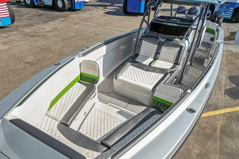 Slide: The Image of 2021 Nor-Tech 390 Sport Center Console boat with luxurious seating and modern design. - 52