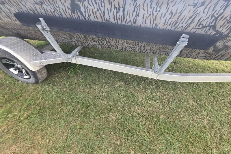 Slide: The Image of Trailer for 2022 Xpress XP200 Catfish boat on grassy surface. - 10