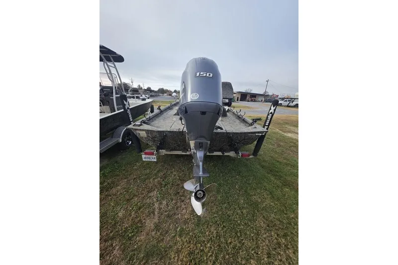 Slide: The Image of 2022 Xpress XP200 Catfish boat with 150 HP outboard motor on trailer. - 3