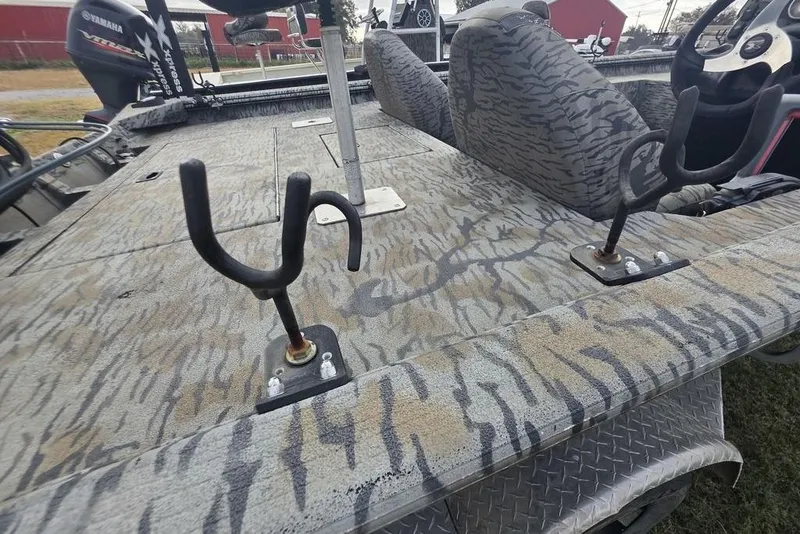Slide: The Image of 2022 Xpress XP200 Catfish boat with camouflage deck and rod holders. - 7