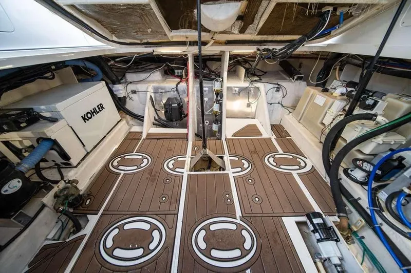 Slide: The Image of Engine room of 2010 Sea Ray 370 Sundancer with Kohler generator and organized wiring. - 12