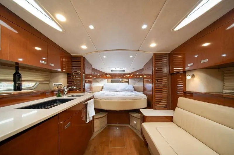 Slide: The Image of Luxurious interior of 2010 Sea Ray 370 Sundancer yacht with modern amenities and elegant design. - 4