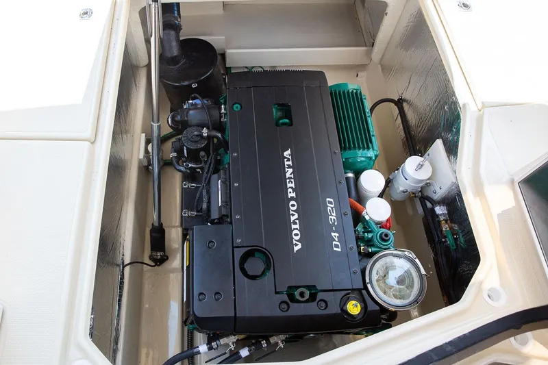 Slide: The Image of Engine compartment of 2026 Ranger Tugs R-31S with Volvo Penta D4-320 engine. - 12