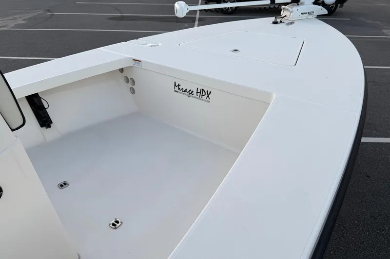 Slide: The Image of 2022 Maverick 18 HPX-V boat deck, featuring spacious storage and sleek design. - 12