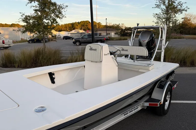 Slide: The Image of 2022 Maverick 18 HPX-V boat on trailer in parking lot, side view. - 13