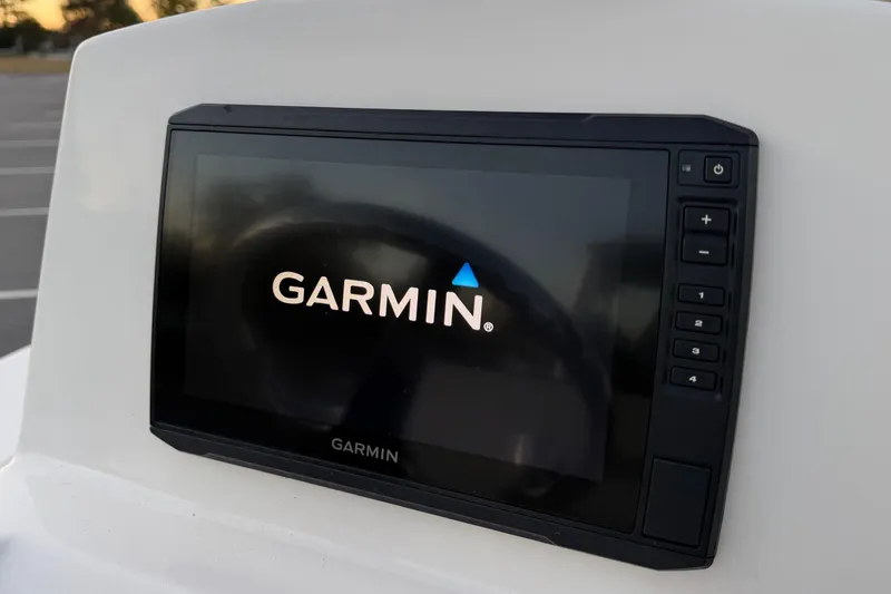 Slide: The Image of Garmin display on 2022 Maverick 18 HPX-V boat dashboard. - 19