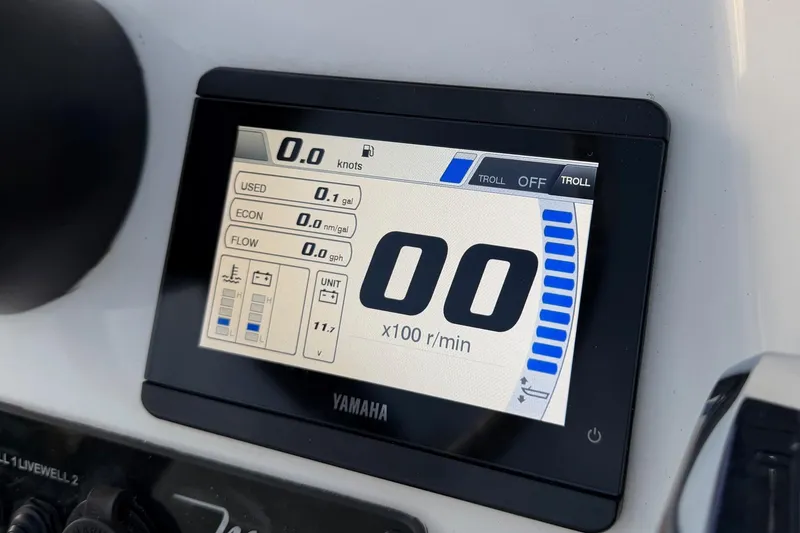Slide: The Image of Yamaha display on 2022 Maverick 18 HPX-V showing speed and fuel metrics. - 21