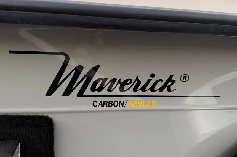 Slide: The Image of 2022 Maverick 18 HPX-V boat logo with Carbon/Kevlar material branding. - 23