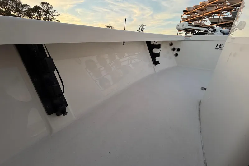 Slide: The Image of 2022 Maverick 18 HPX-V boat interior with sleek white finish and modern equipment. - 26
