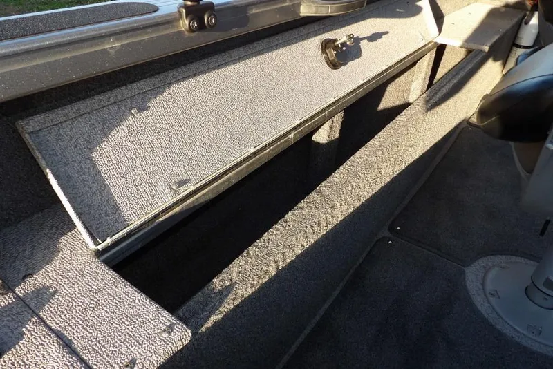 Slide: The Image of 2018 Crestliner 1950 Fish Hawk WT boat interior storage compartment. - 18
