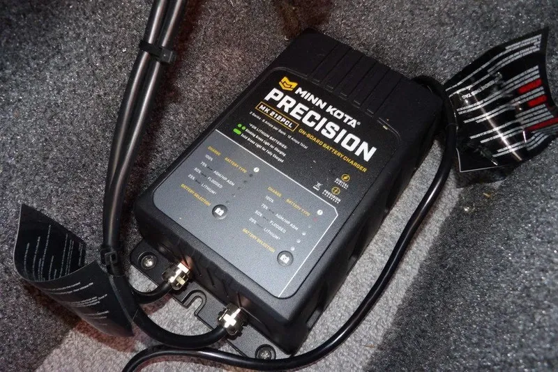 Slide: The Image of Minn Kota Precision onboard battery charger in 2018 Crestliner 1950 Fish Hawk WT. - 21