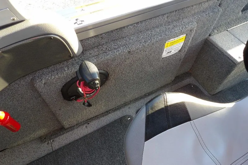 Slide: The Image of Interior of 2018 Crestliner 1950 Fish Hawk WT boat, featuring seating and safety equipment. - 36