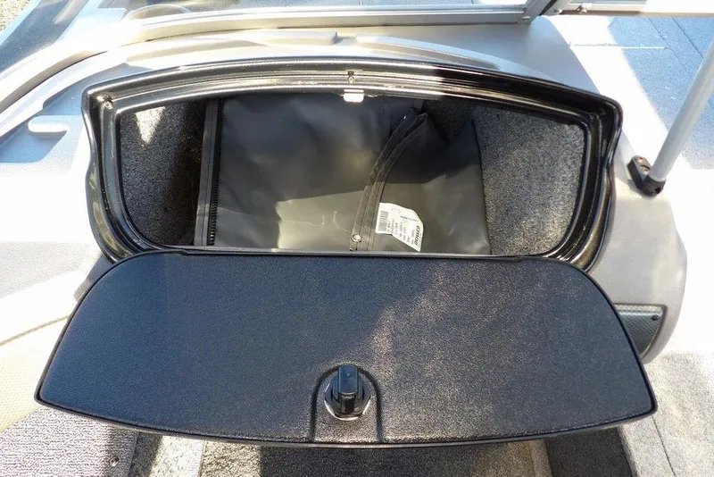 Slide: The Image of Storage compartment of 2018 Crestliner 1950 Fish Hawk WT boat, open with visible interior. - 38