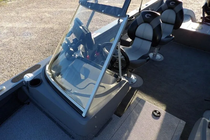 Slide: The Image of 2018 Crestliner 1950 Fish Hawk WT interior with steering console and seating. - 39