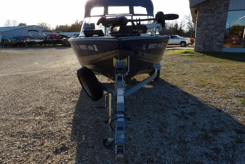 Slide: The Image of 2018 Crestliner 1950 Fish Hawk WT boat on trailer in outdoor setting. - 4