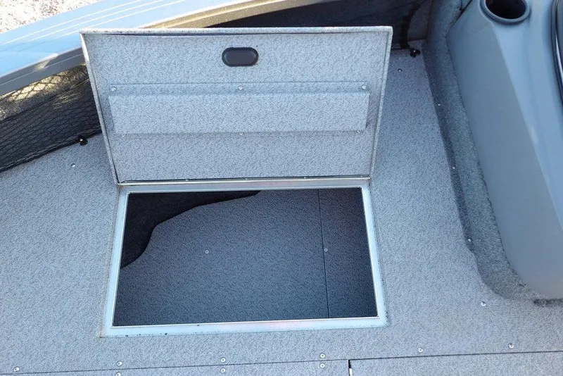 Slide: The Image of 2018 Crestliner 1950 Fish Hawk WT boat with open storage compartment. - 46