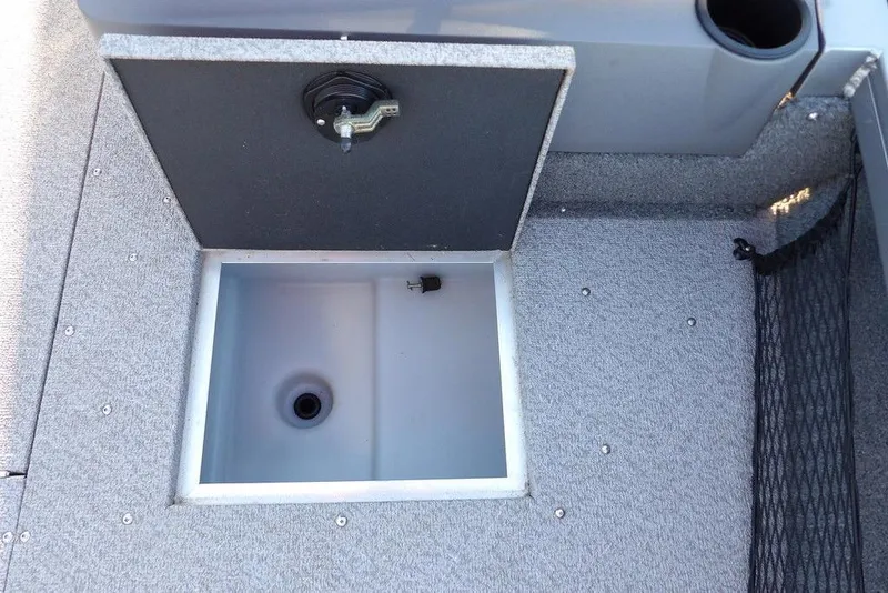 Slide: The Image of 2018 Crestliner 1950 Fish Hawk WT boat storage compartment, open lid, gray interior. - 48