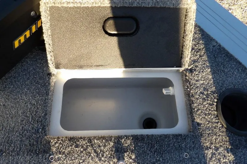 Slide: The Image of Open storage compartment in 2018 Crestliner 1950 Fish Hawk WT boat. - 51