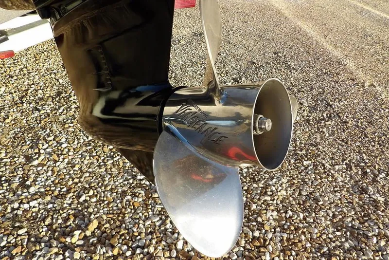 Slide: The Image of Propeller of 2018 Crestliner 1950 Fish Hawk WT on gravel surface. - 69