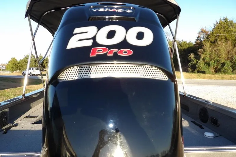 Slide: The Image of 2018 Crestliner 1950 Fish Hawk WT with 200 Pro engine, outdoor setting. - 70