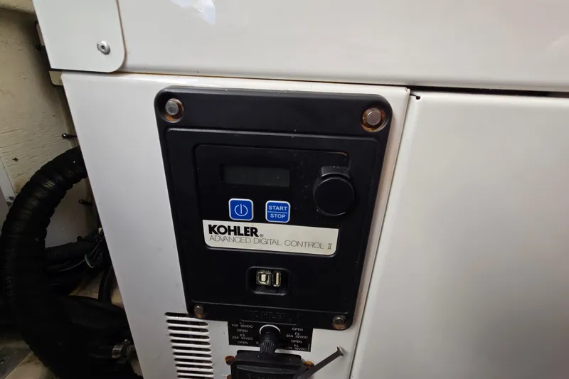 Slide: The Image of Kohler Advanced Digital Control panel on 2015 Monterey 315 Sport Yacht. - 26